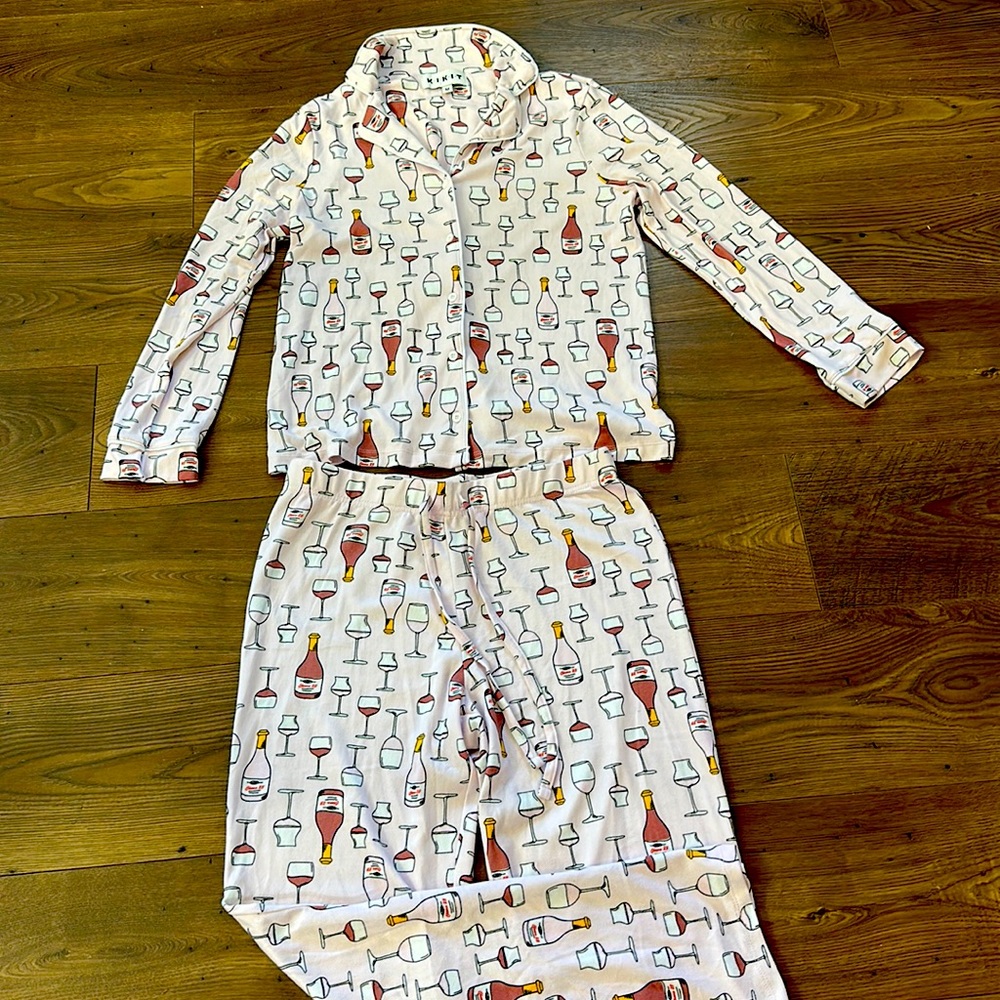 beautiful pajamas, long sleeves and pants with a wine print.  Size M.
